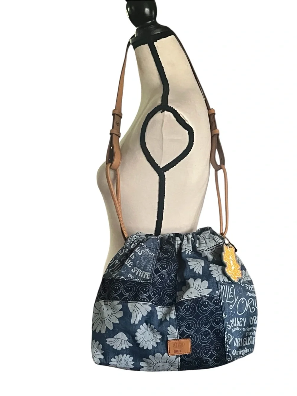 Fossil x Smiley limited edition patchwork denim drawstring shoulder bag.